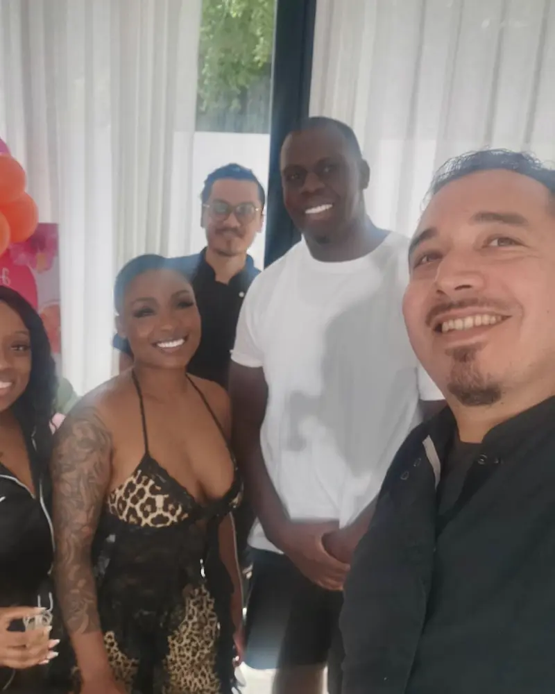 The chef with guests after a private celebration at the villa